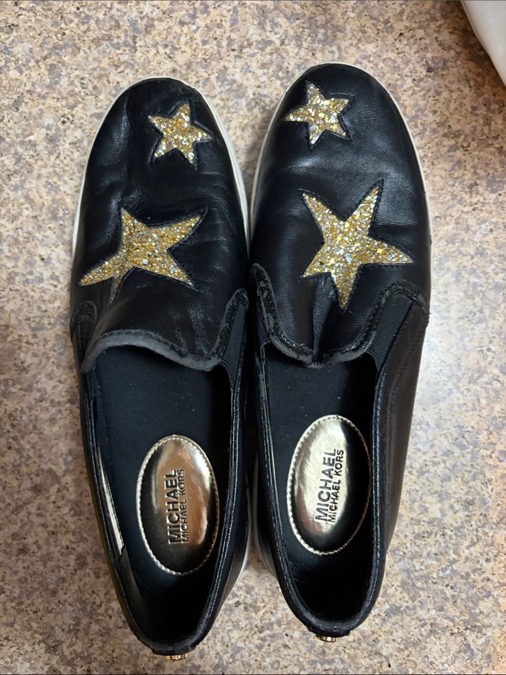 MICHAEL Michael Kors Black Slip-On Sneakers with Gold Glitter Stars